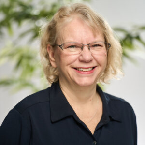 A headshot of Kyla Wiebe smiling