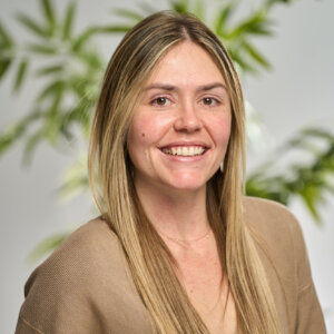 A headshot of Nicole McDonald smiling