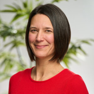 A headshot of Rebecca Atkinson smiling