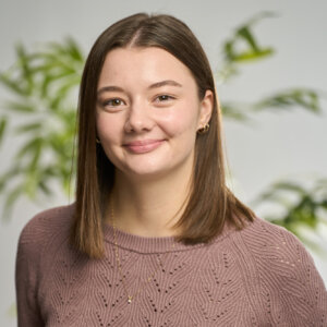 A headshot of Sierra Dueck smiling