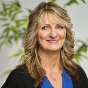 A headshot of Wendy Halliday smiling